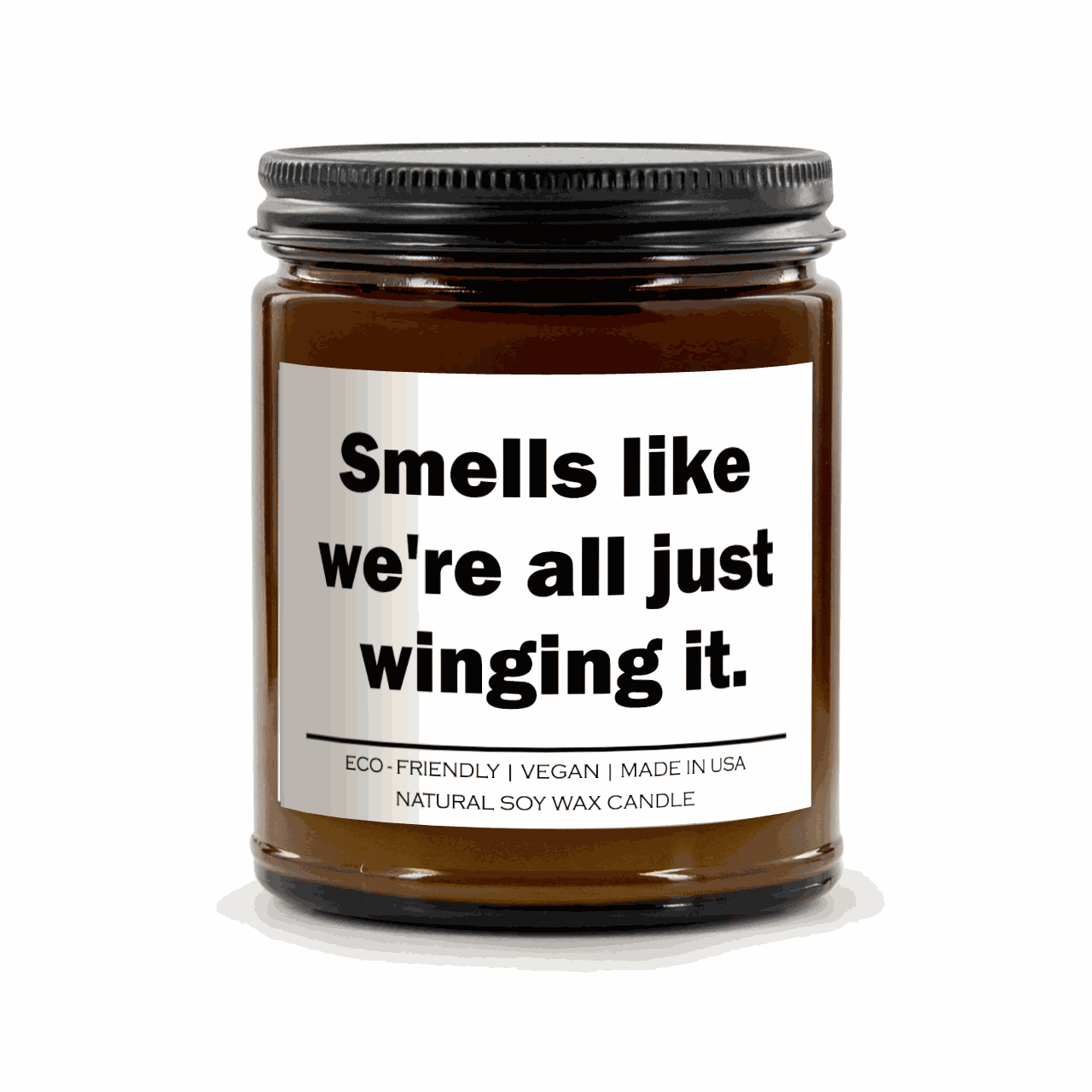 Smells like we're all just winging it Candle in amber jar with eco-friendly natural soy wax and vegan label
