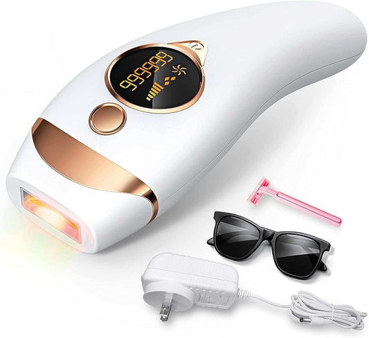 IPL hair removal device with digital display, 999,999 flashes, white and gold body, includes charger, sunglasses, and razor.