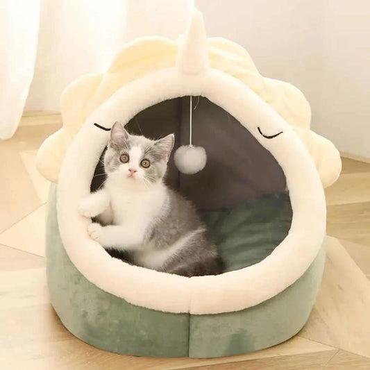 Adorable Dinosaur Pet House with soft padded bed and hanging toy ball featuring a cozy cat inside