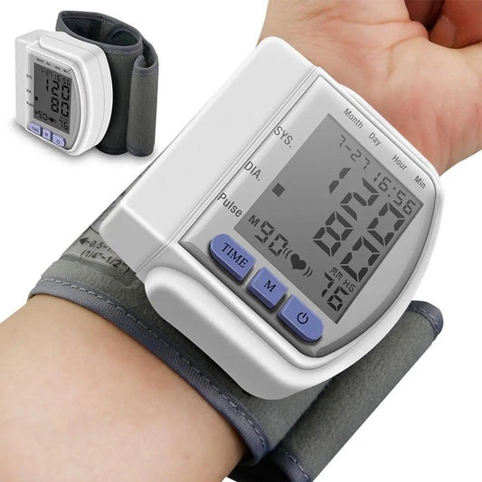 Digital wrist blood pressure monitor with LCD display for systolic, diastolic, and pulse measurement