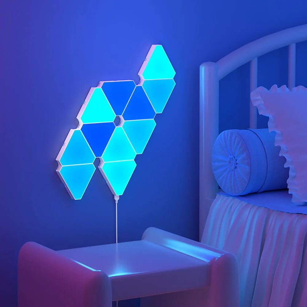 LED Triangular Quantum Lamp RGB wall-mounted smart light with color-changing panels in a bedroom setting