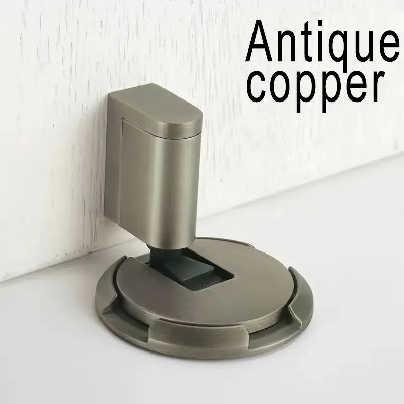 Windproof door stopper in antique copper finish preventing door movement and protecting walls and floors