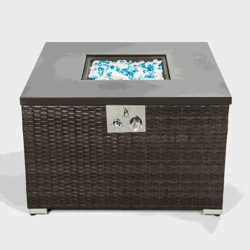 Square outdoor gas fire pit with dark brown wicker body and steel tabletop with blue decorative fire glass
