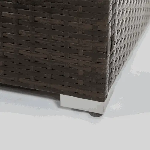 Close-up of dark brown wicker corner and metal leg of outdoor gas fire pit table