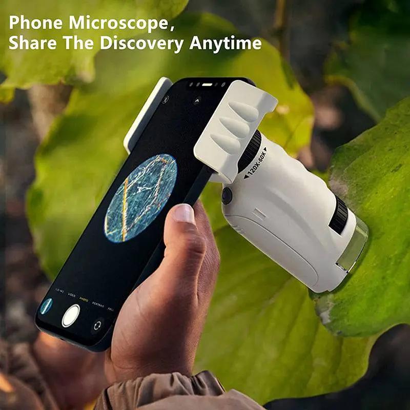 Kids pocket microscope attached to smartphone for outdoor scientific exploration