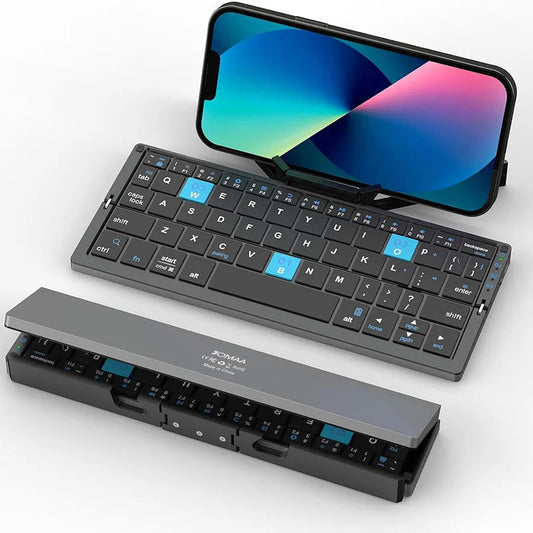 Black pocket foldable Bluetooth keyboard with stand holder for mobile phones and tablets