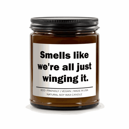 Smells like we're all just winging it Candle in amber jar with eco-friendly natural soy wax and vegan label