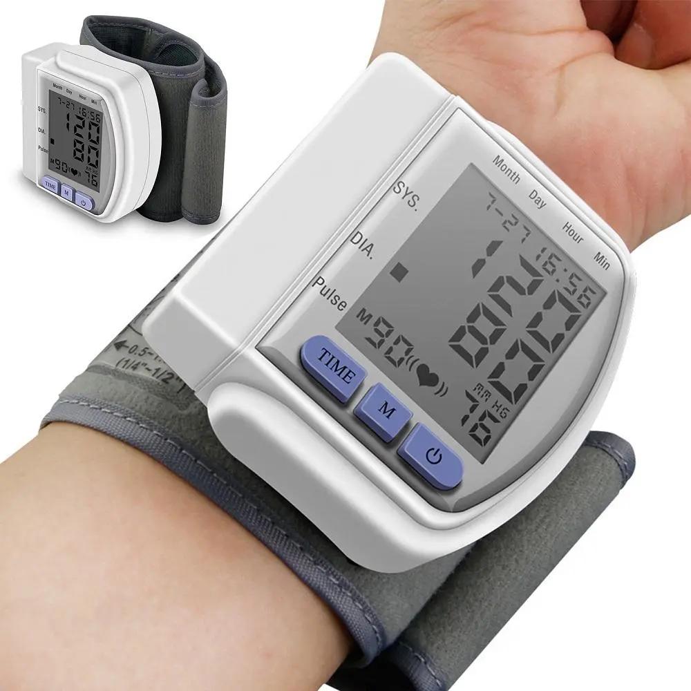 Digital wrist blood pressure monitor with LCD display for systolic, diastolic, and pulse measurement