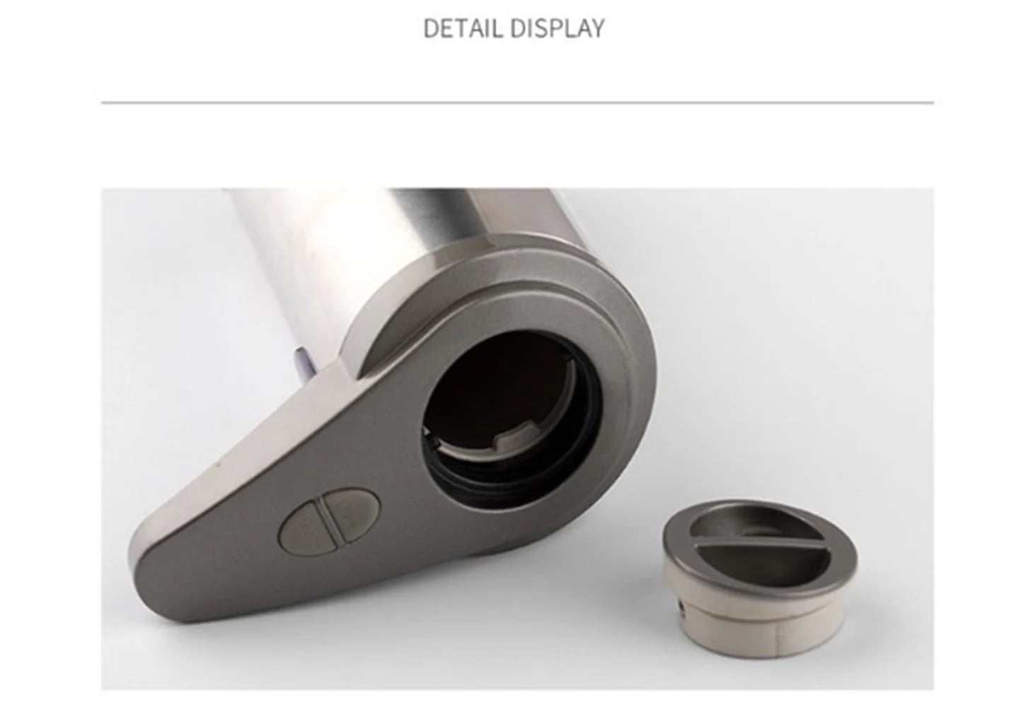 close-up of stainless steel automatic liquid soap dispenser nozzle and refill cap showing non-drip design and touchless feature