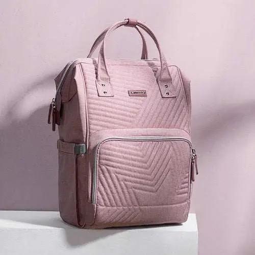 Pink quilted diaper bag backpack with multiple pockets and durable Oxford fabric design