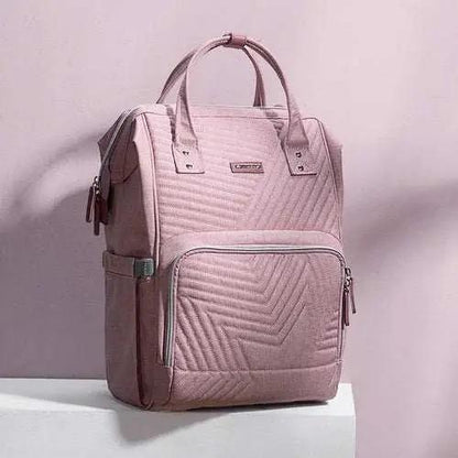 Pink quilted diaper bag backpack with multiple pockets and durable Oxford fabric design