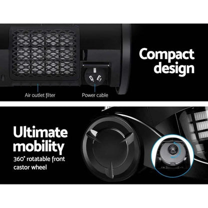 Close-up of Devanti Vacuum Cleaner showing air outlet filter, power cable, and 360-degree rotatable front castor wheel for ultimate mobility and compact design