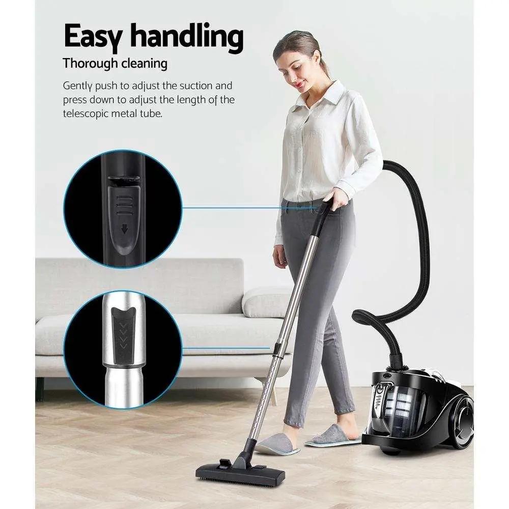 Woman using Devanti bagless vacuum cleaner with telescopic stainless steel handle for home cleaning