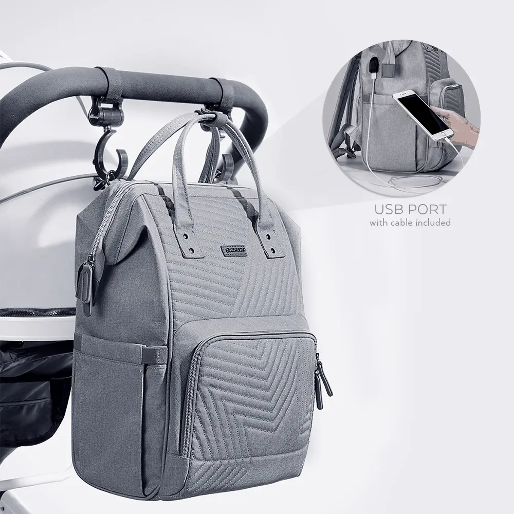 Quilted diaper bag backpack hanging on stroller with USB port and multiple pockets in gray Oxford fabric