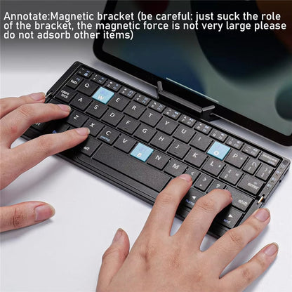 Black pocket foldable Bluetooth keyboard with stand for mobile phones and tablets