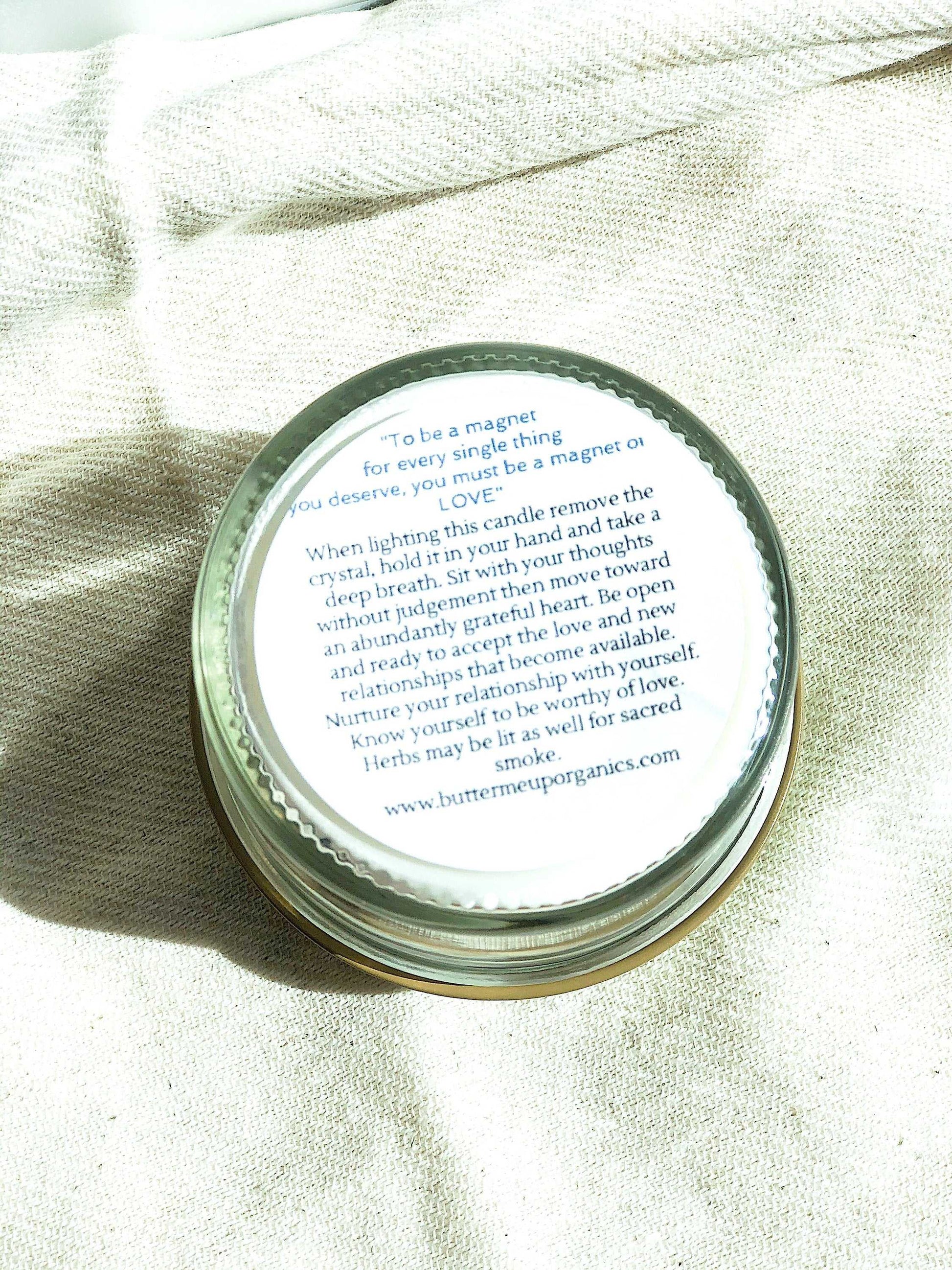 Love Spell candle in glass jar with love spell text on lid, hand-poured soy wax, wood wick, rose quartz, red roses, pink salt for love and healing rituals