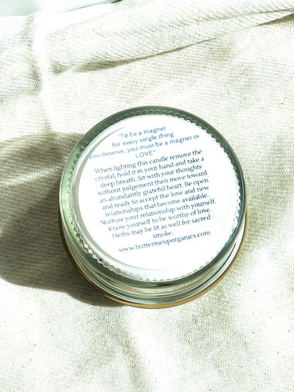 Love Spell candle in glass jar with love spell text on lid, hand-poured soy wax, wood wick, rose quartz, red roses, pink salt for love and healing rituals