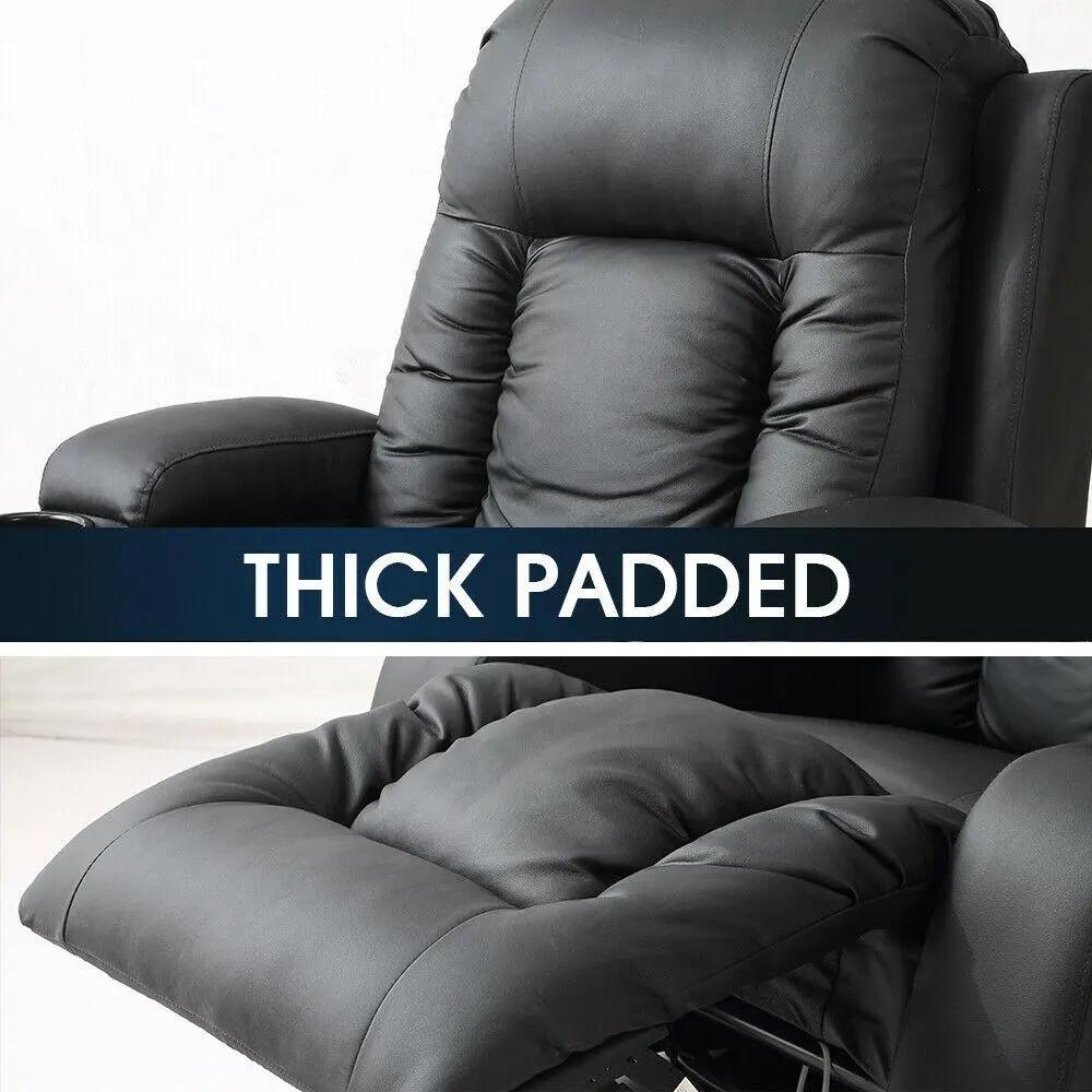 Black electric massage chair with thick padded cushion and armrest in reclined position
