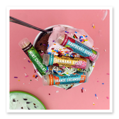 Ice Cream Mix 4 pack lip balm set with Orange Creamsicle, Banana Split, Raspberry Sorbet, and Mint Chocolate flavors in a dessert-themed display