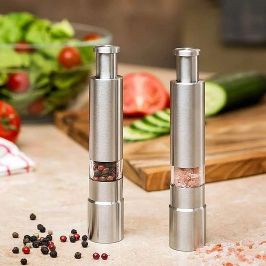 Premium stainless steel salt and pepper grinders with one-handed press operation for fresh spice grinding